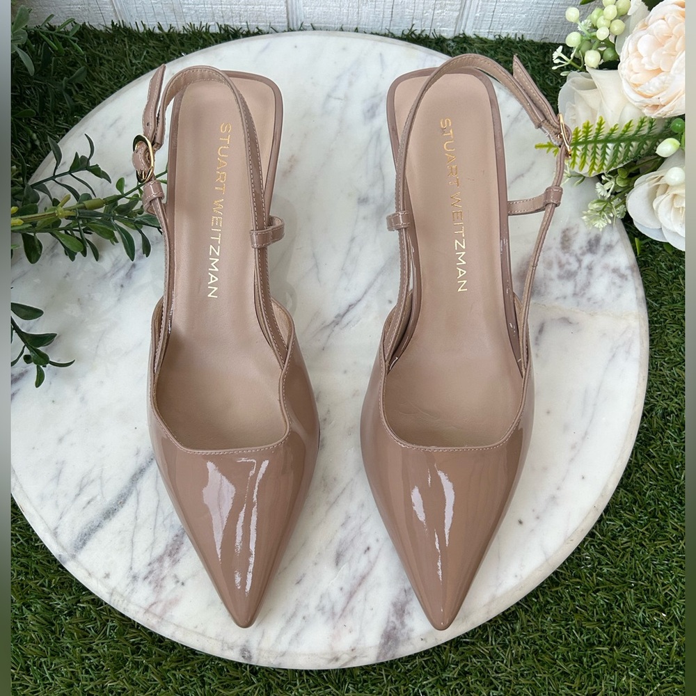 Stuart Weitzman
Vinnie Patent Kitten Slingback Pumps
$525
50mm BEIGE 6.5B NEW - Picture 8 of 16